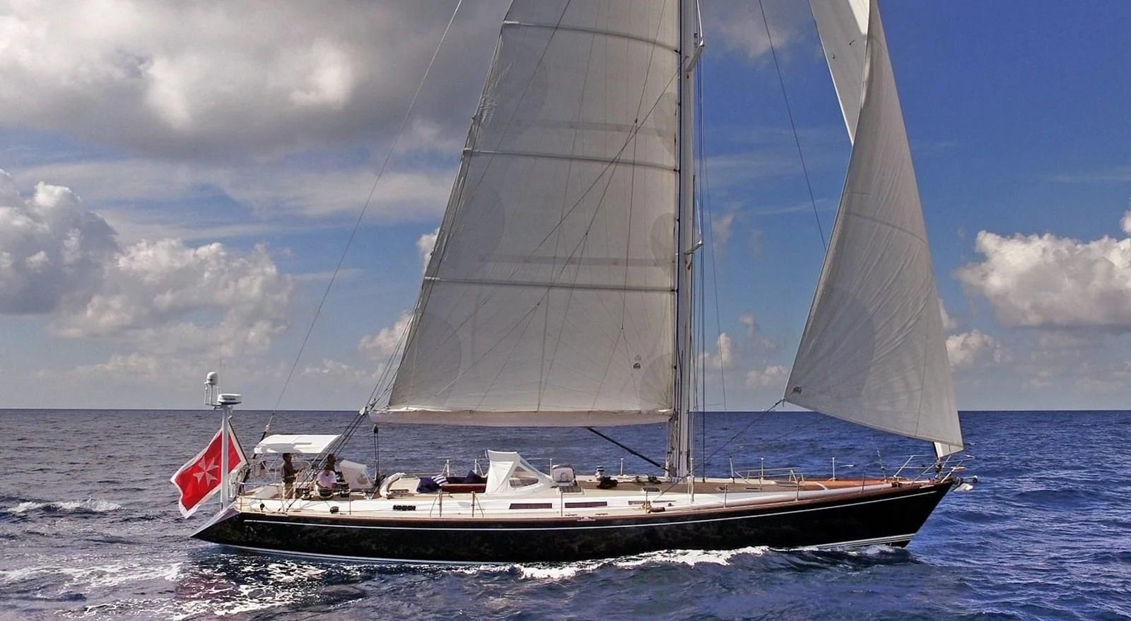 a sailboat on the water aboard FAR OUT Yacht for Sale
