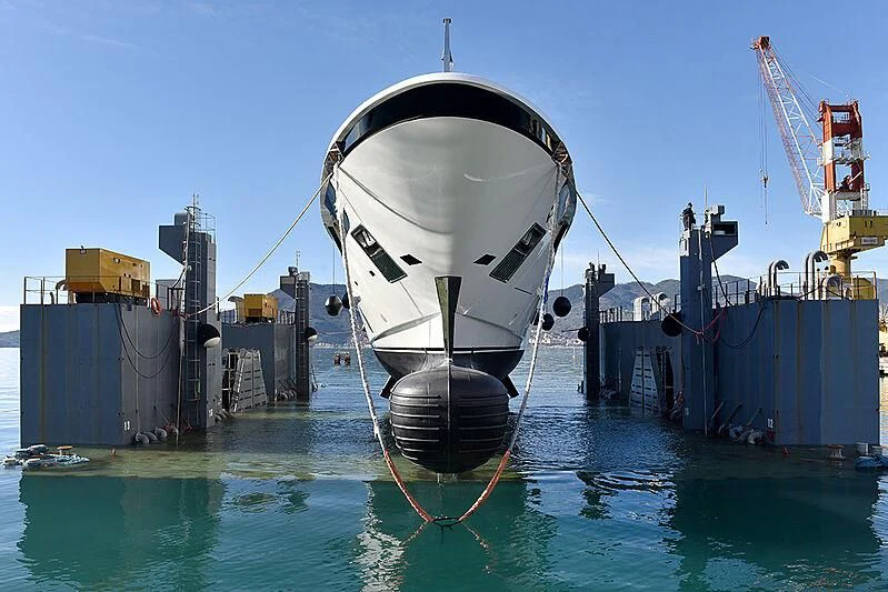 a large white and black ship docked aboard ORAS Yacht for Sale