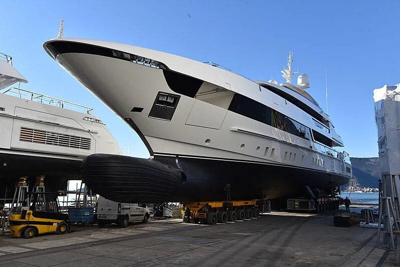 a large white ship docked aboard ORAS Yacht for Sale