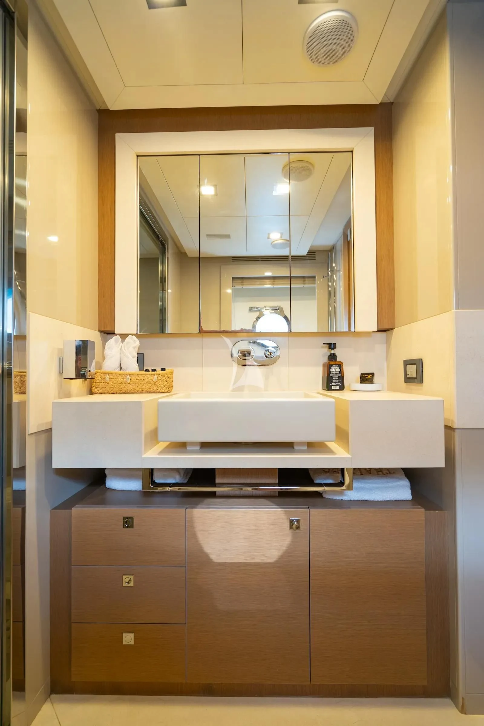 a bathroom with a large mirror aboard THALYSSA Yacht for Charter