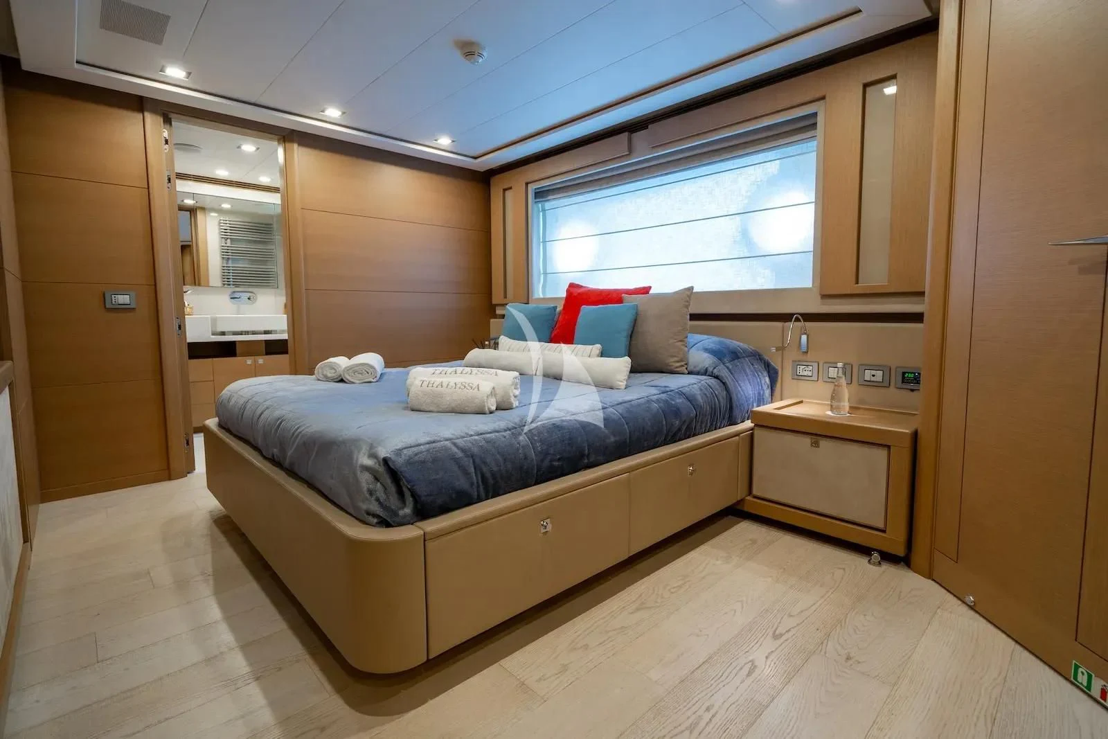 a bed in a room aboard THALYSSA Yacht for Charter