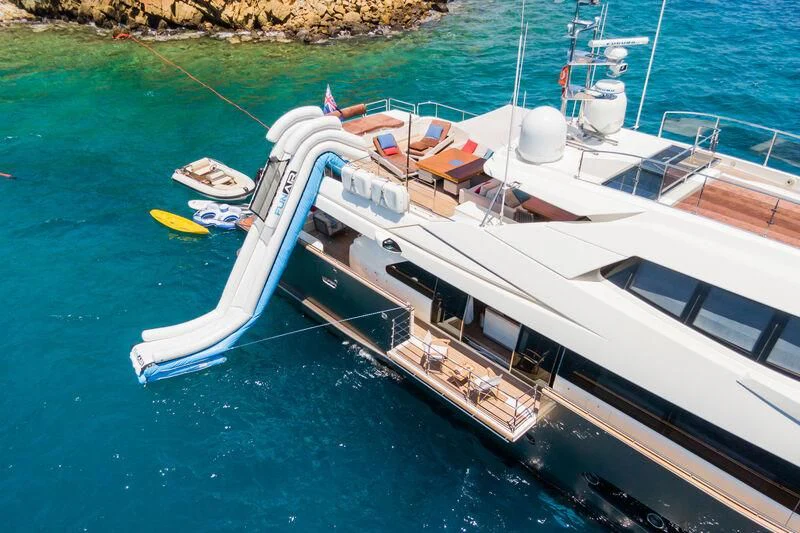 a boat docked at a pier aboard THALYSSA Yacht for Charter