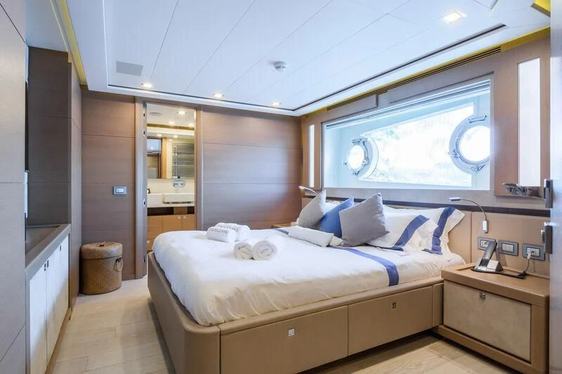 a bed in a room aboard THALYSSA Yacht for Charter
