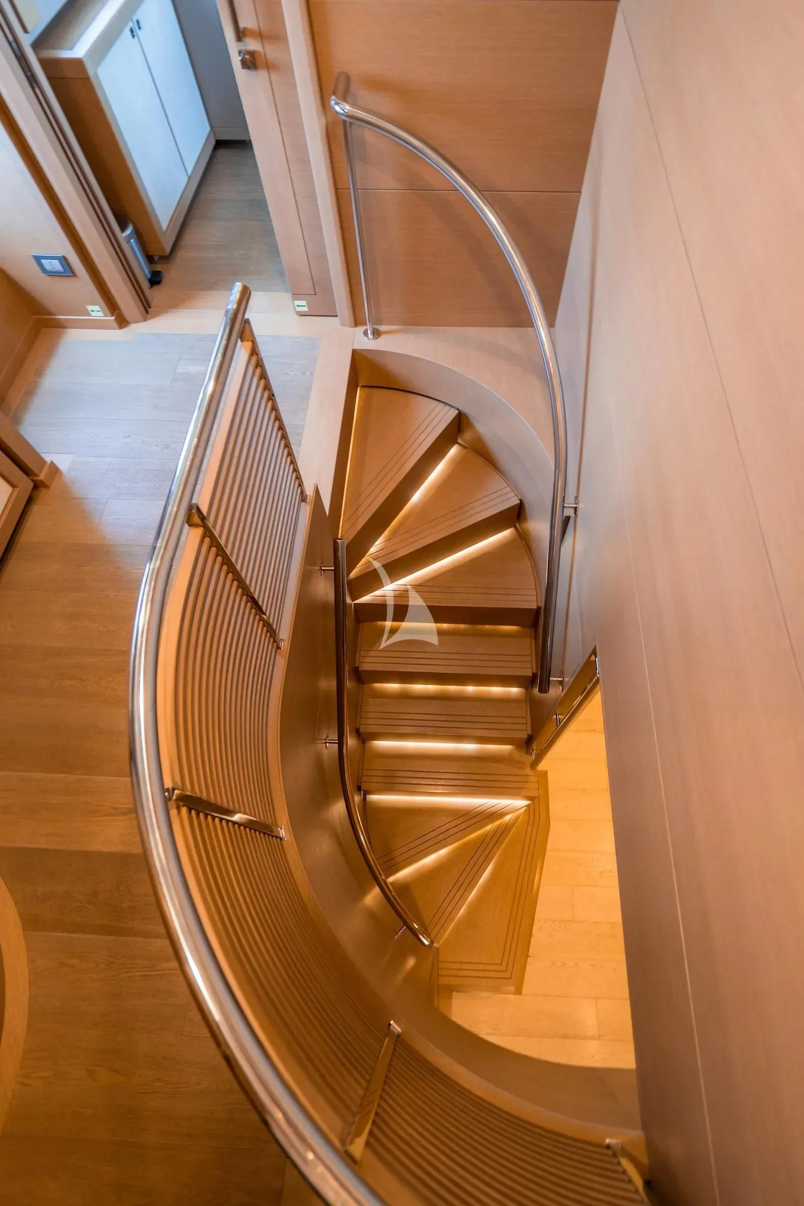 a metal staircase in a room aboard THALYSSA Yacht for Charter