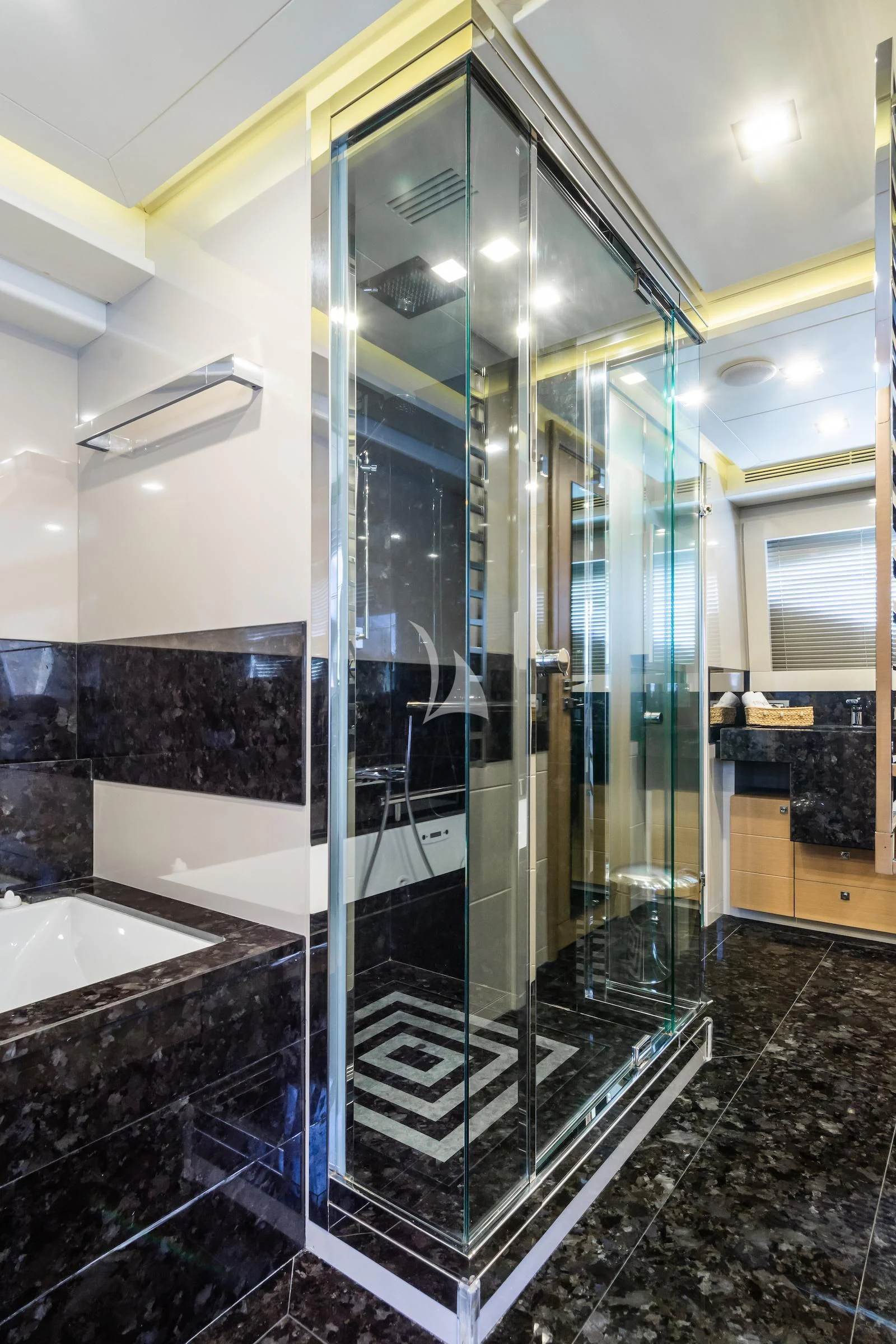 a shower unit in a bathroom aboard THALYSSA Yacht for Charter
