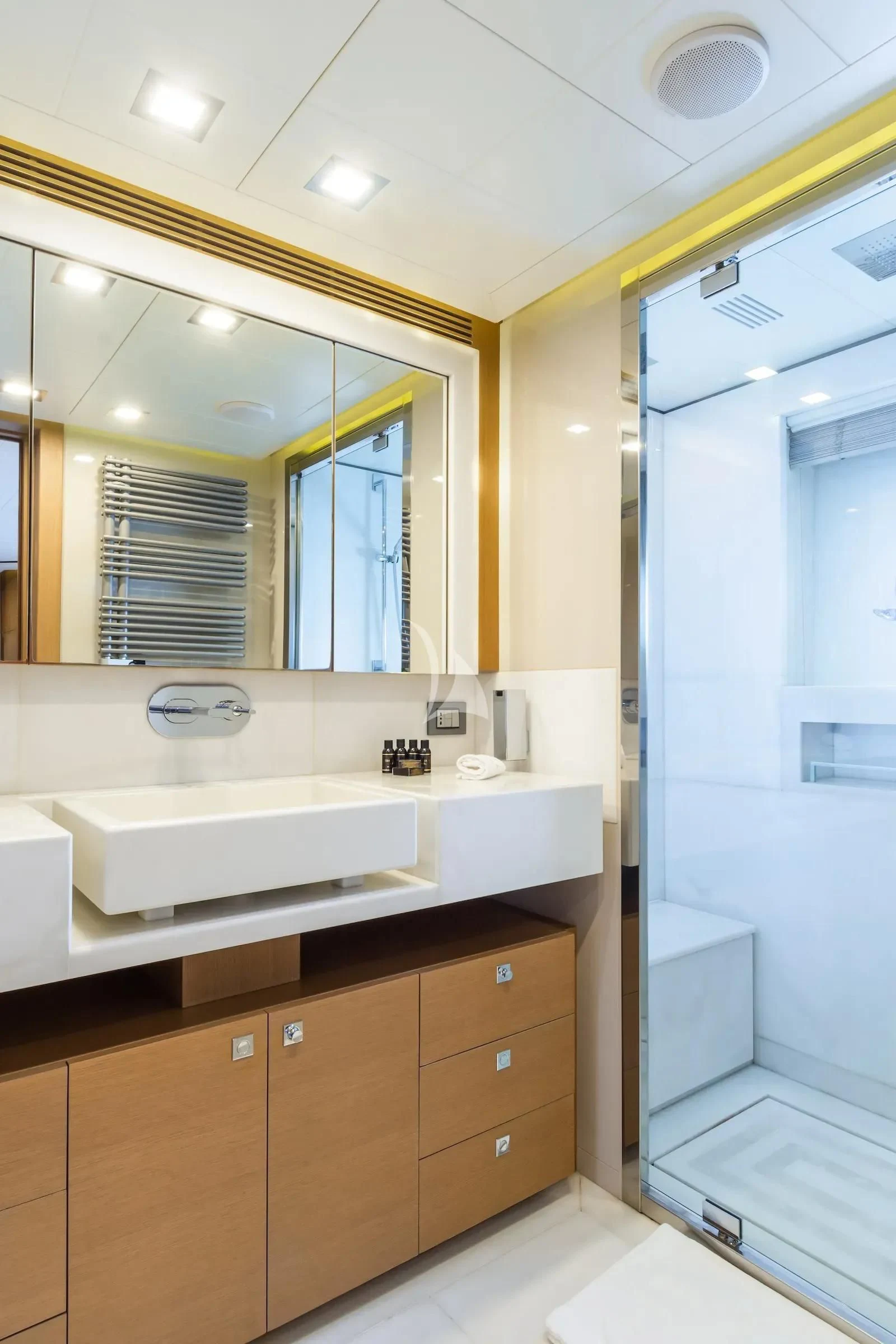 a bathroom with a large mirror aboard THALYSSA Yacht for Charter