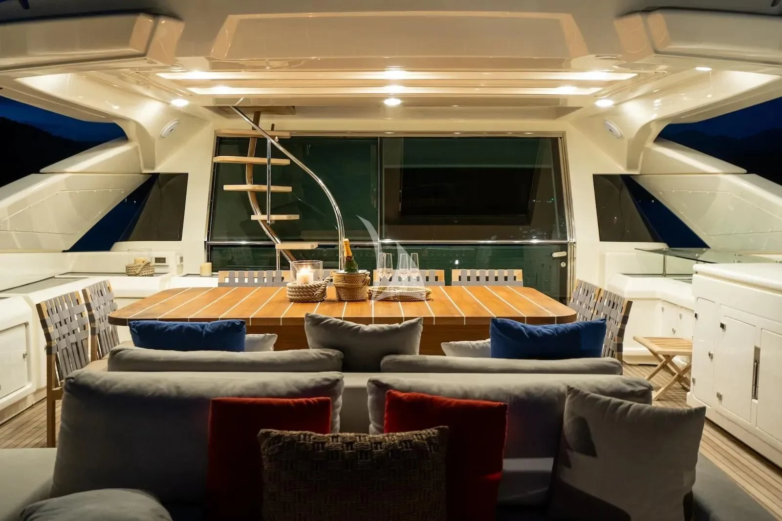 a room with chairs and a table aboard THALYSSA Yacht for Charter