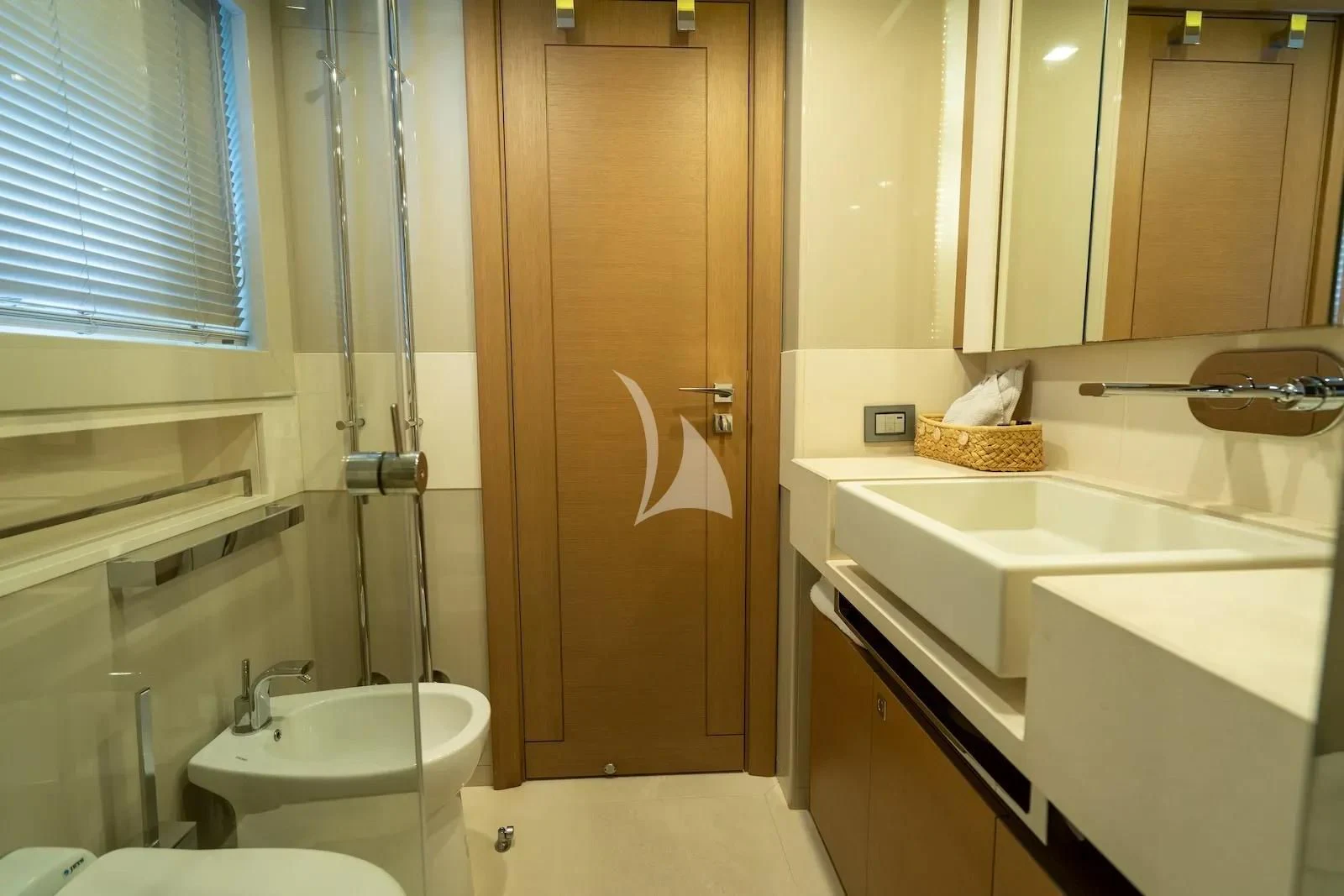 a bathroom with a sink and a toilet aboard THALYSSA Yacht for Charter