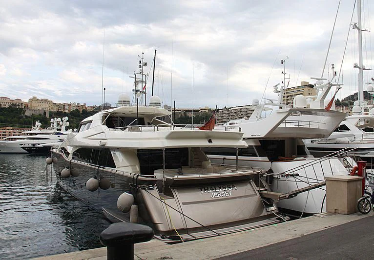 a boat is parked on the dock aboard THALYSSA Yacht for Charter