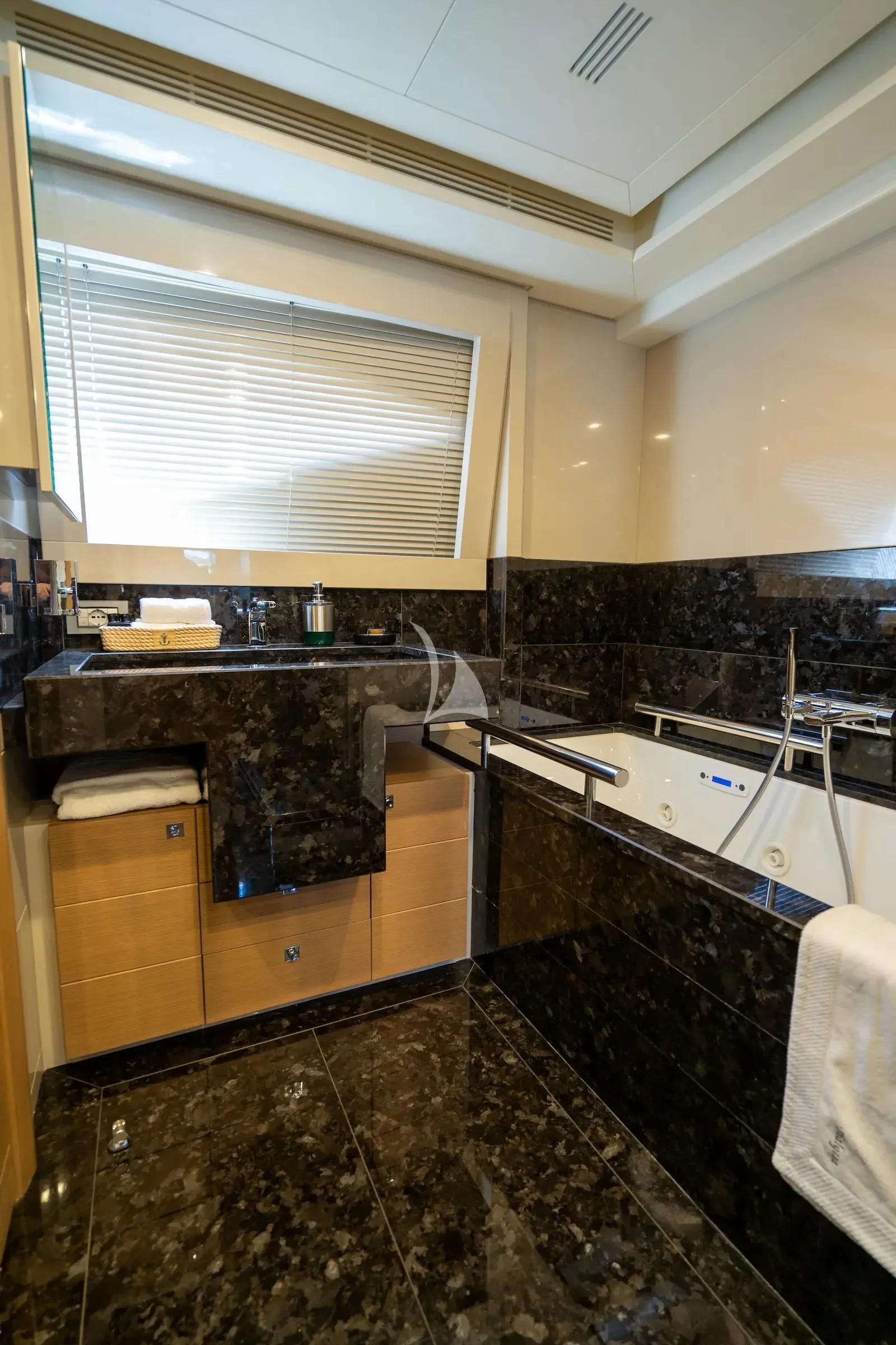 a kitchen with a marble counter top aboard THALYSSA Yacht for Charter