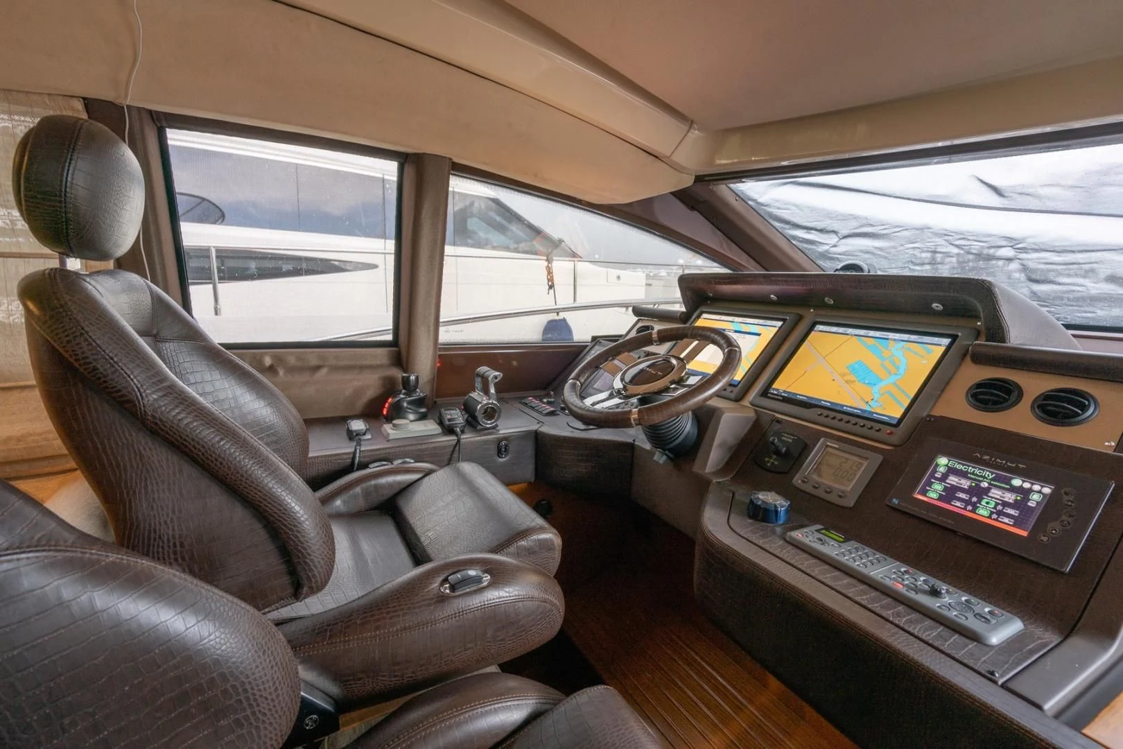 inside of a car aboard SYLVIA VI Yacht for Sale