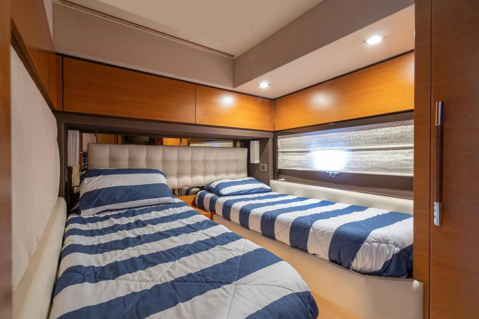 a room with bunk beds aboard SYLVIA VI Yacht for Sale