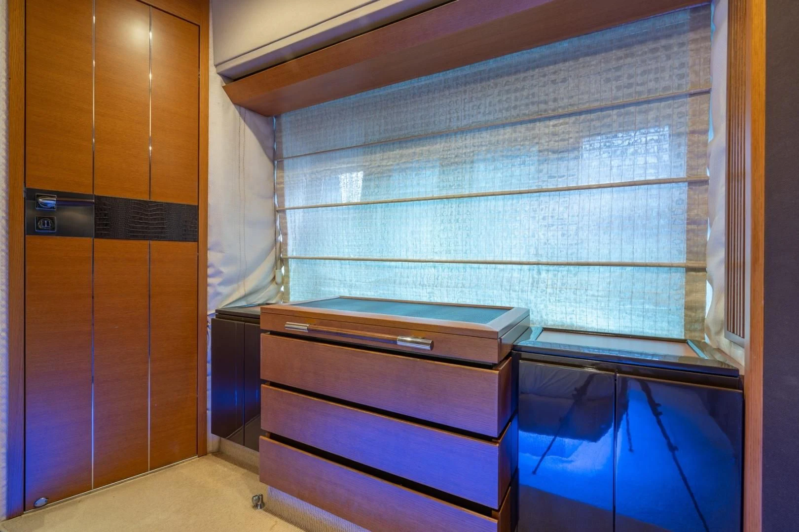 a room with a dresser and a window aboard SYLVIA VI Yacht for Sale