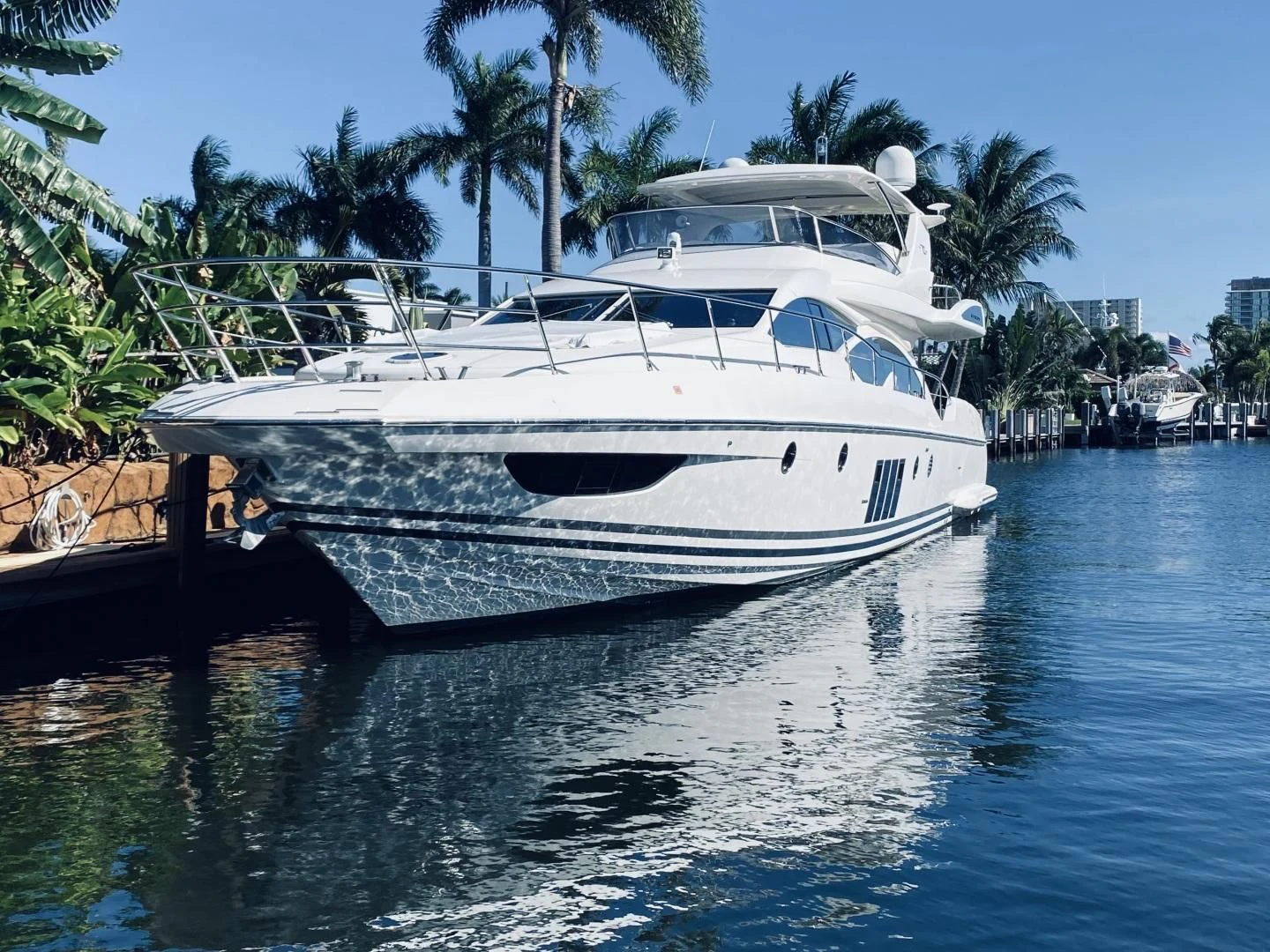 a white boat in the water aboard SYLVIA VI Yacht for Sale