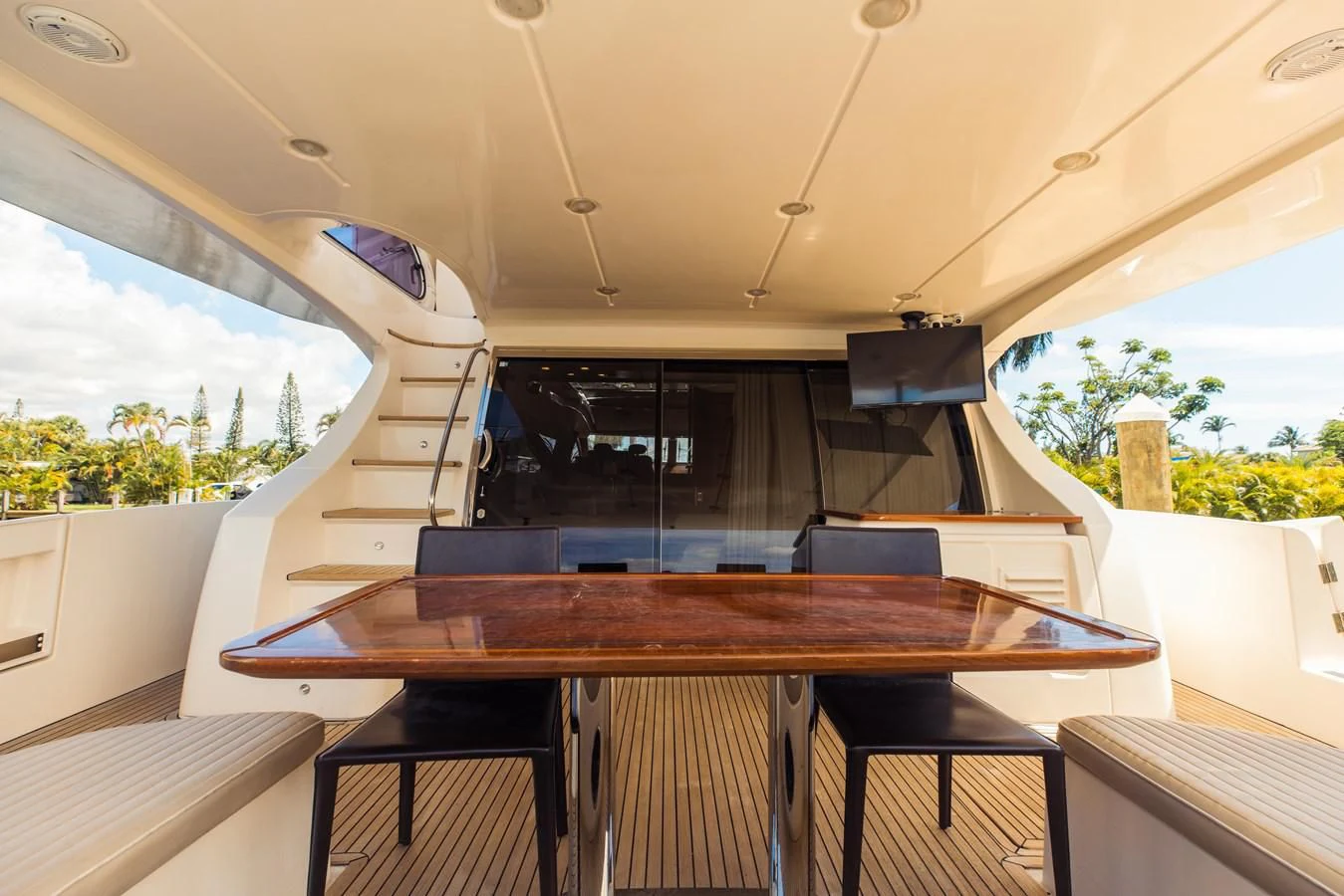 a room with a table and chairs aboard SYLVIA VI Yacht for Sale