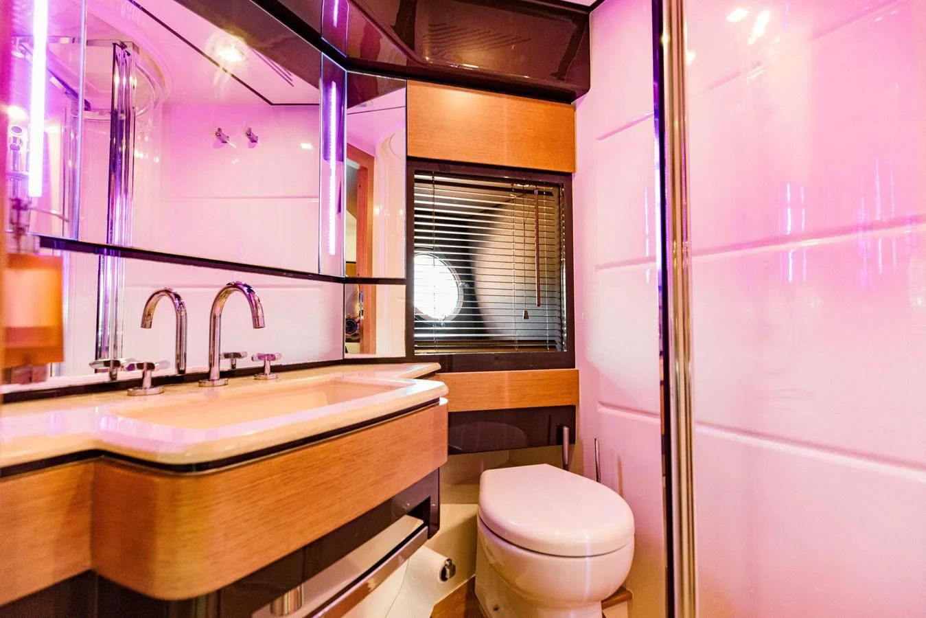 a bathroom with a sink and toilet aboard SYLVIA VI Yacht for Sale
