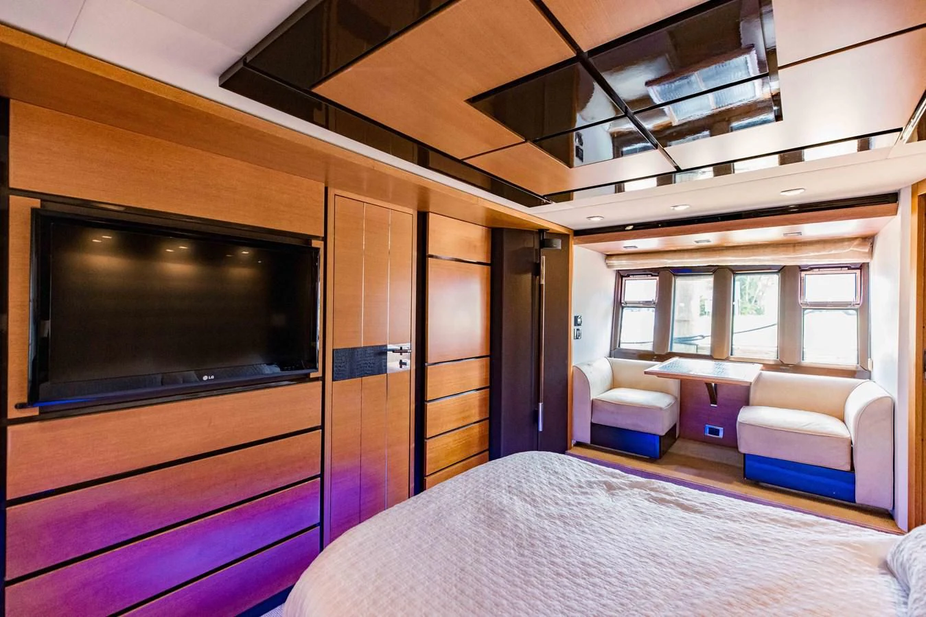 a room with a bed and a tv aboard SYLVIA VI Yacht for Sale