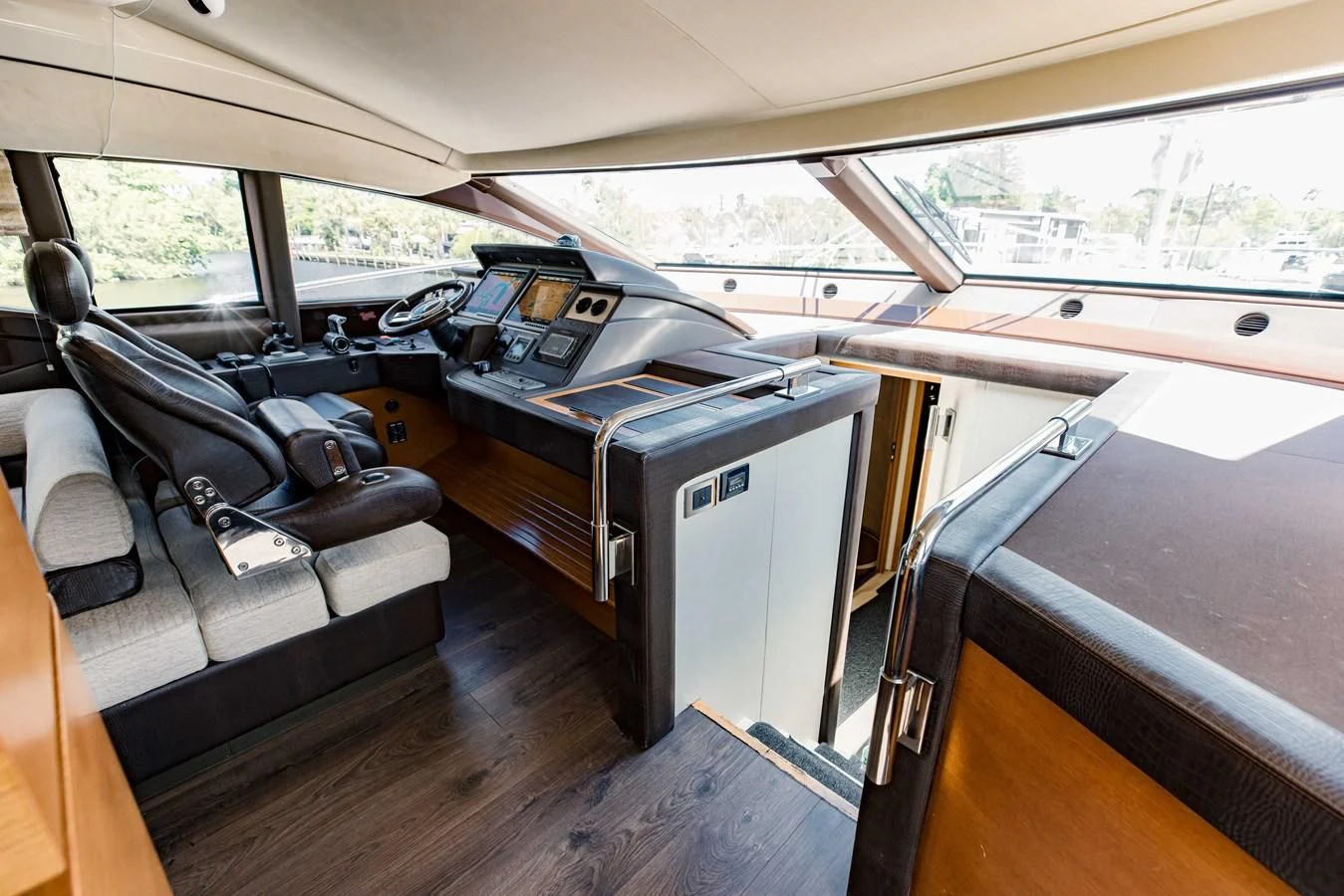 a room with a couch and a desk aboard SYLVIA VI Yacht for Sale