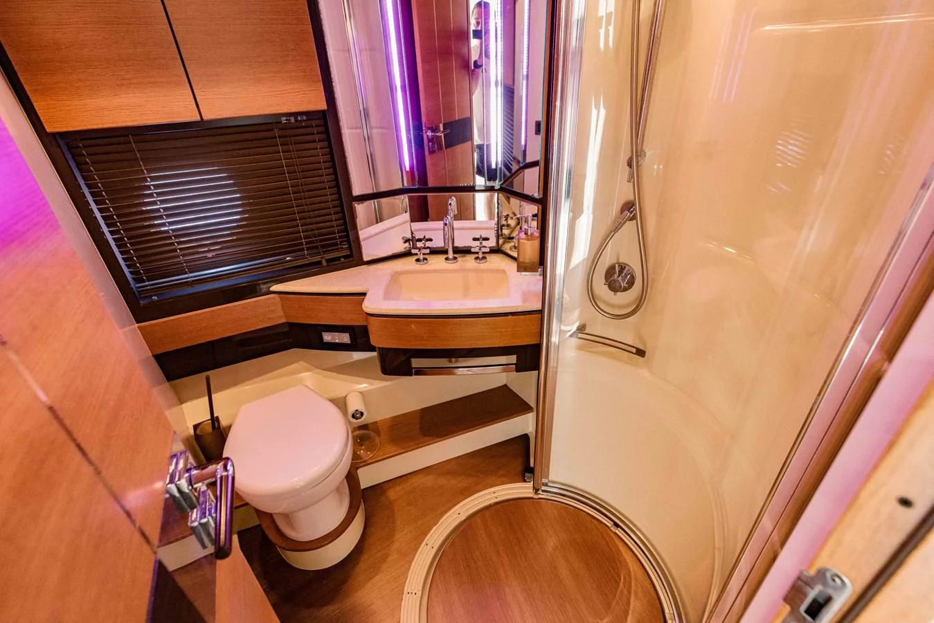 a bathroom with a sink toilet and a bathtub aboard SYLVIA VI Yacht for Sale