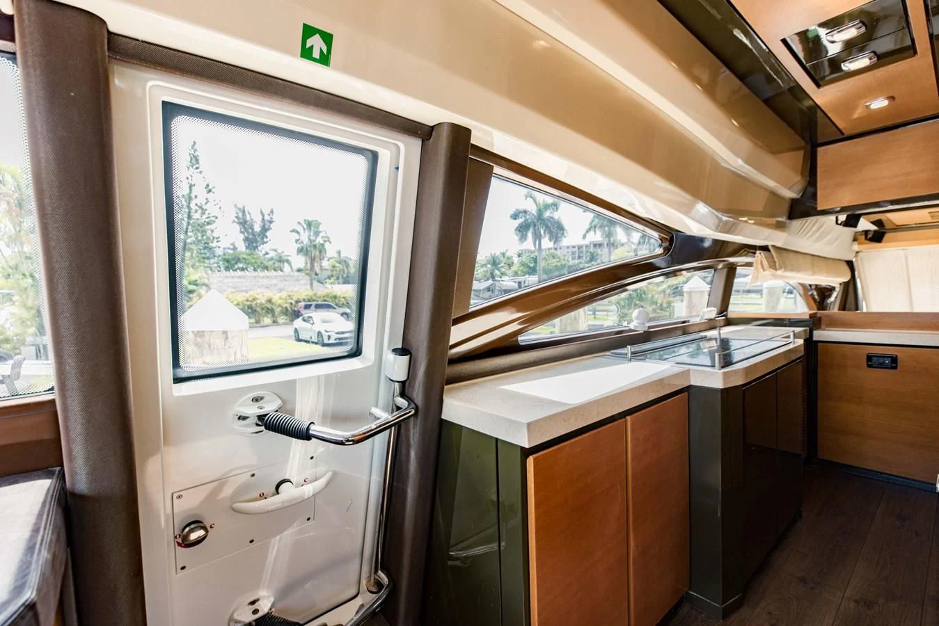 a kitchen with a window aboard SYLVIA VI Yacht for Sale