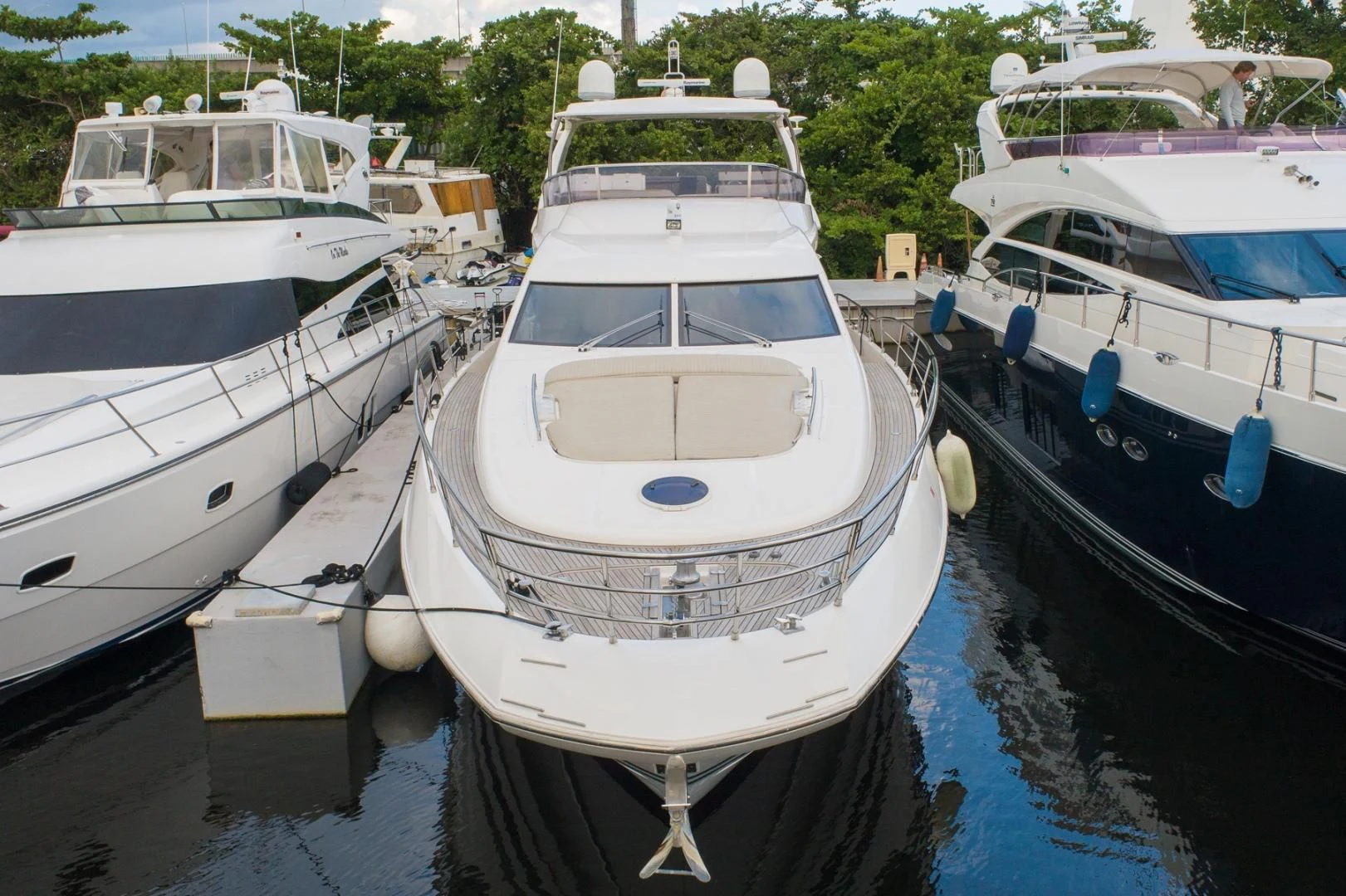 a group of boats are parked in a harbor aboard SYLVIA VI Yacht for Sale