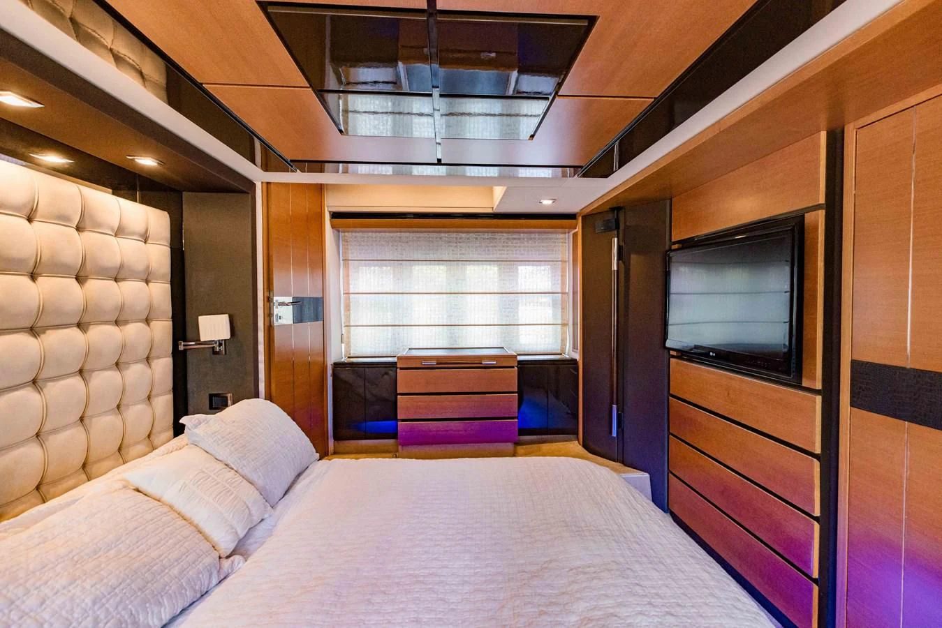 a bed in a room aboard SYLVIA VI Yacht for Sale