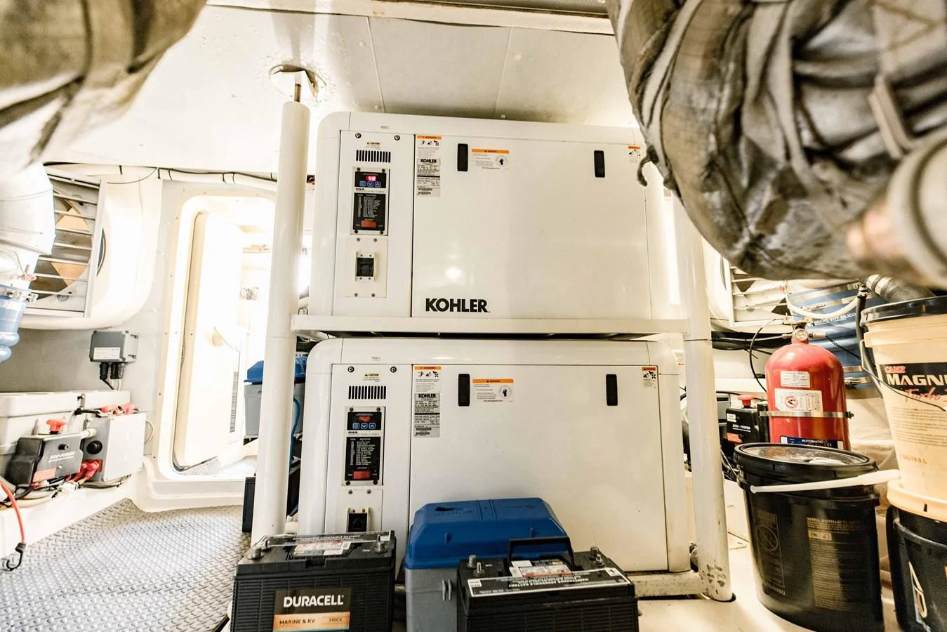 a person working on a machine aboard SYLVIA VI Yacht for Sale
