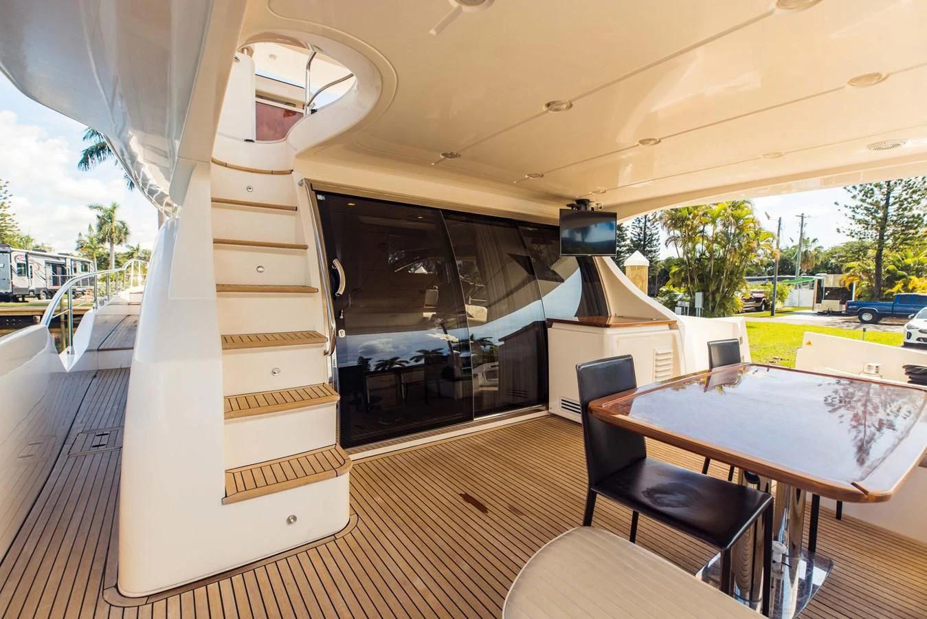a room with a table and chairs aboard SYLVIA VI Yacht for Sale