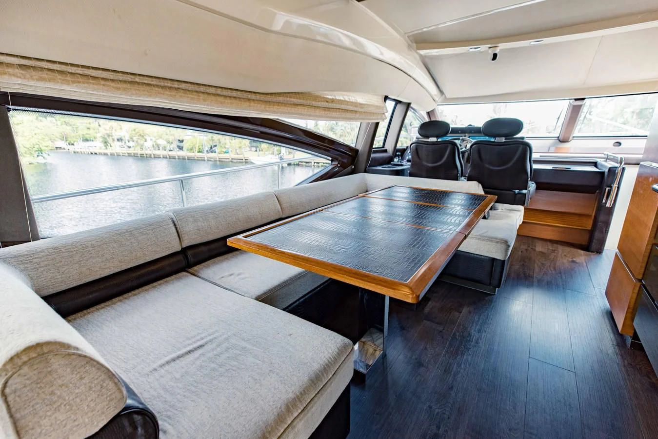 a boat with a table and chairs aboard SYLVIA VI Yacht for Sale
