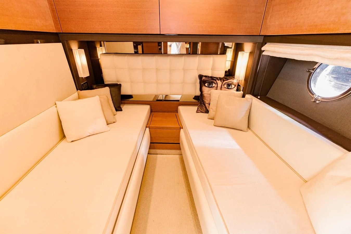 a room with a bed and a chair aboard SYLVIA VI Yacht for Sale