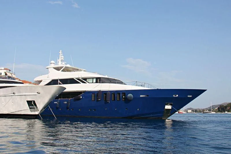 a couple of boats in the water aboard IPANEMAS Yacht for Sale