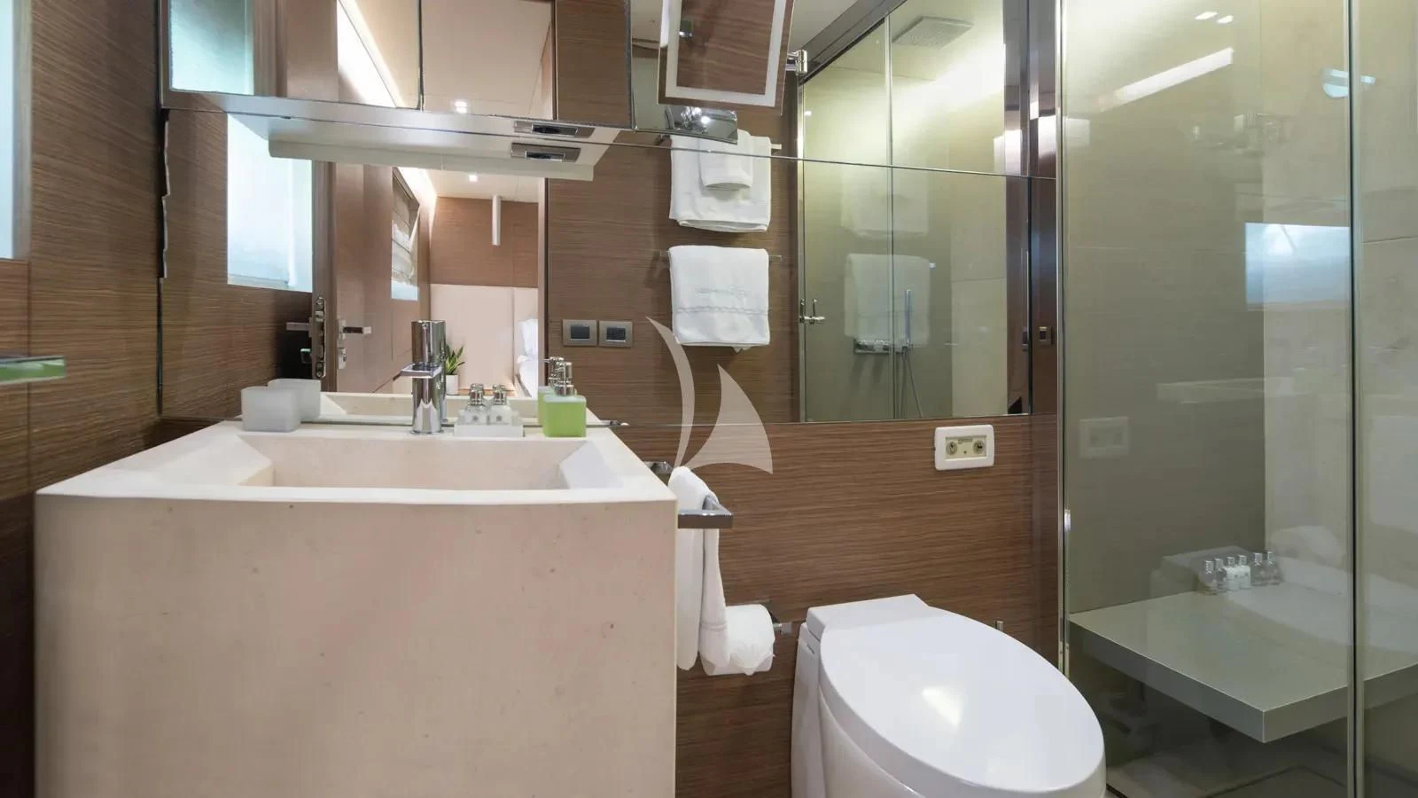 a bathroom with a glass shower aboard IPANEMAS Yacht for Sale