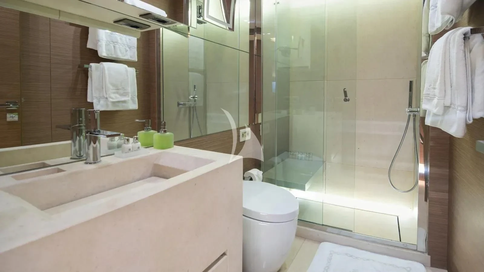 a bathroom with a glass shower aboard IPANEMAS Yacht for Sale