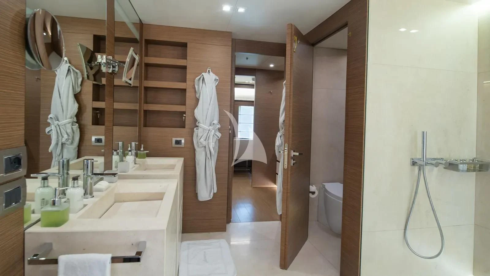 a bathroom with a sink and a mirror aboard IPANEMAS Yacht for Sale