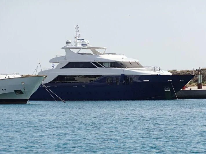 a large white yacht docked aboard IPANEMAS Yacht for Sale