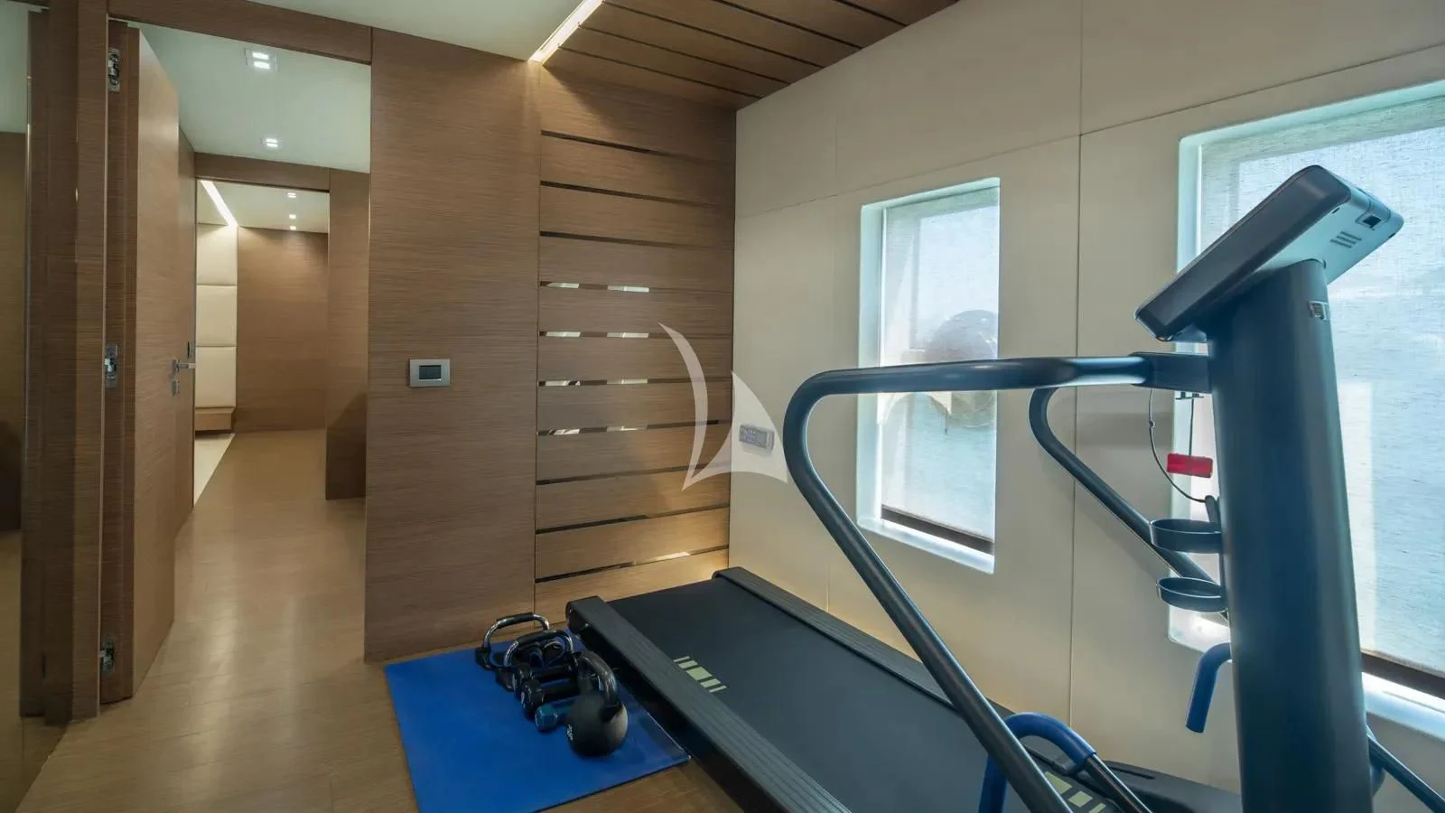 a room with a computer and a window aboard IPANEMAS Yacht for Sale