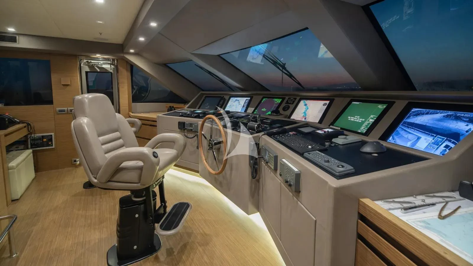 a room with computers and monitors aboard IPANEMAS Yacht for Sale