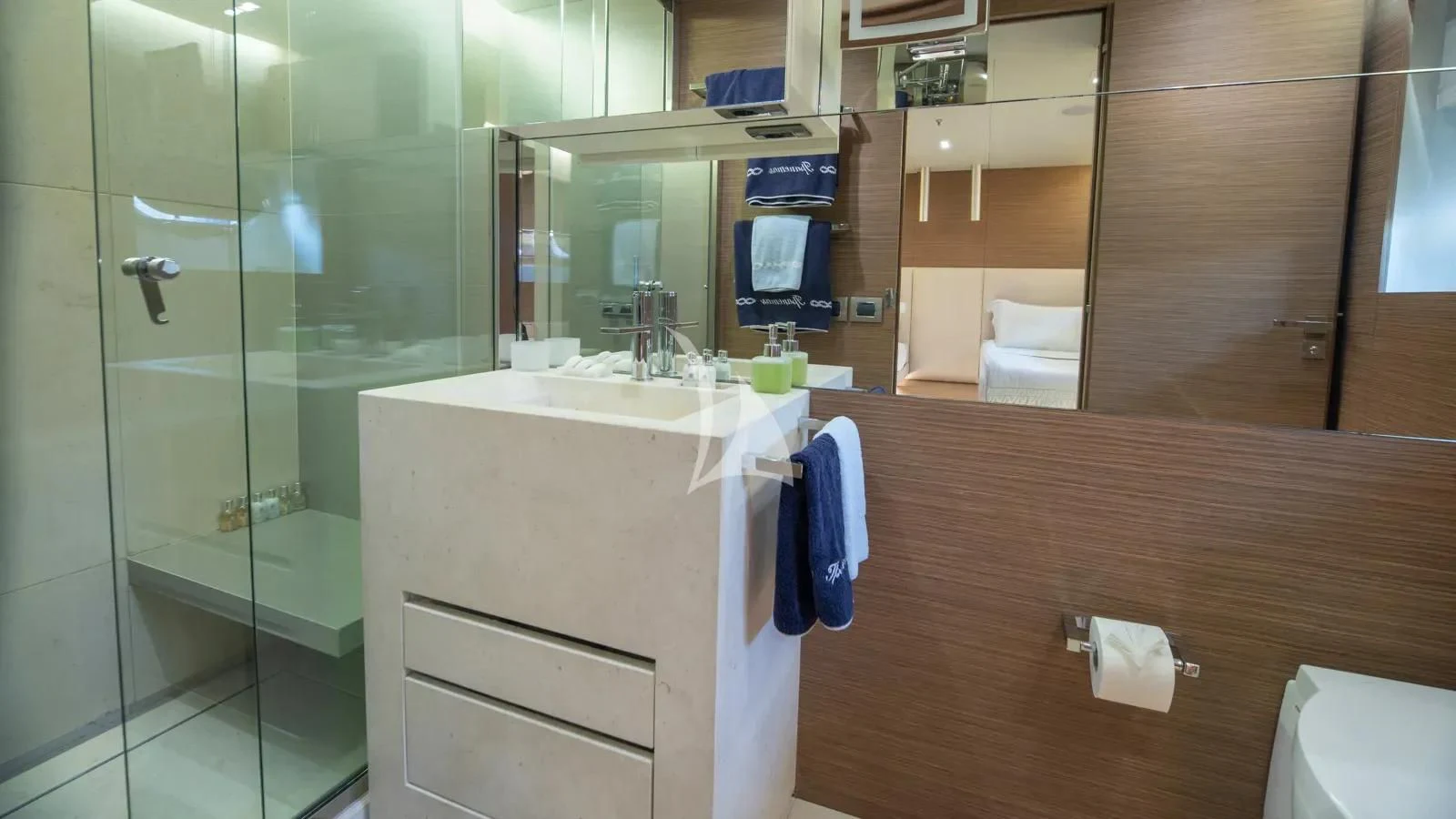 a bathroom with a glass shower aboard IPANEMAS Yacht for Sale