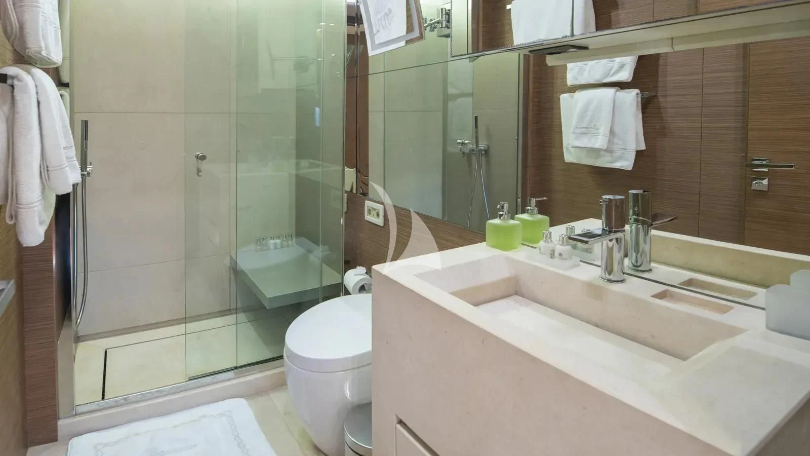 a bathroom with a large mirror aboard IPANEMAS Yacht for Sale