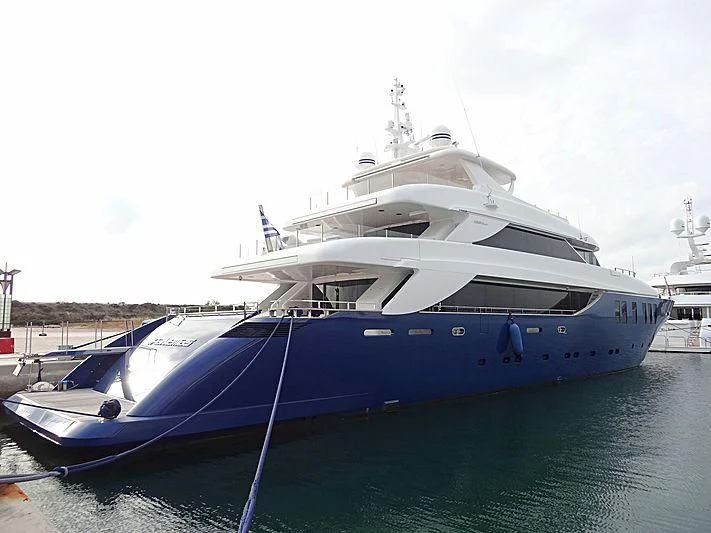 a large white boat docked aboard IPANEMAS Yacht for Sale