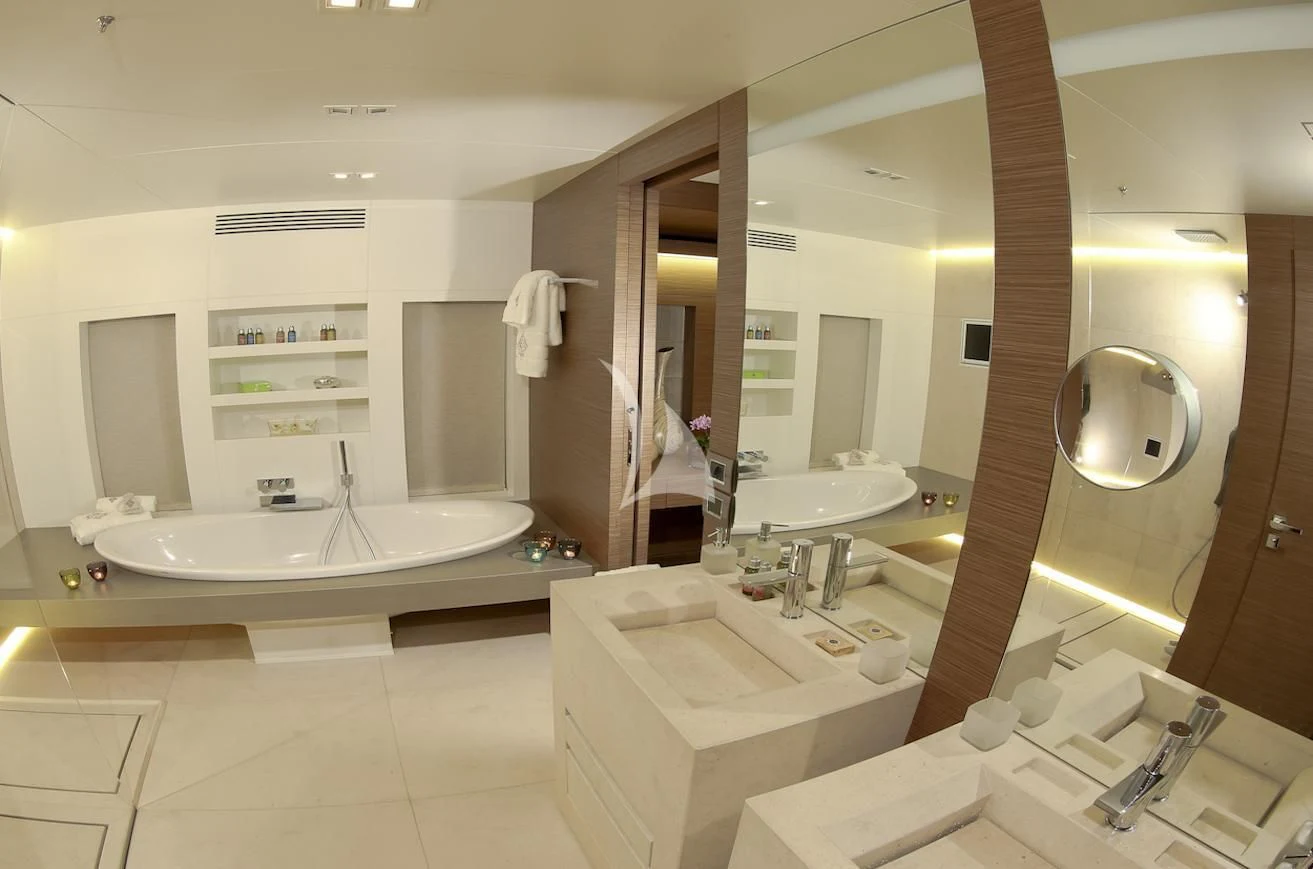 a bathroom with a large tub aboard IPANEMAS Yacht for Sale