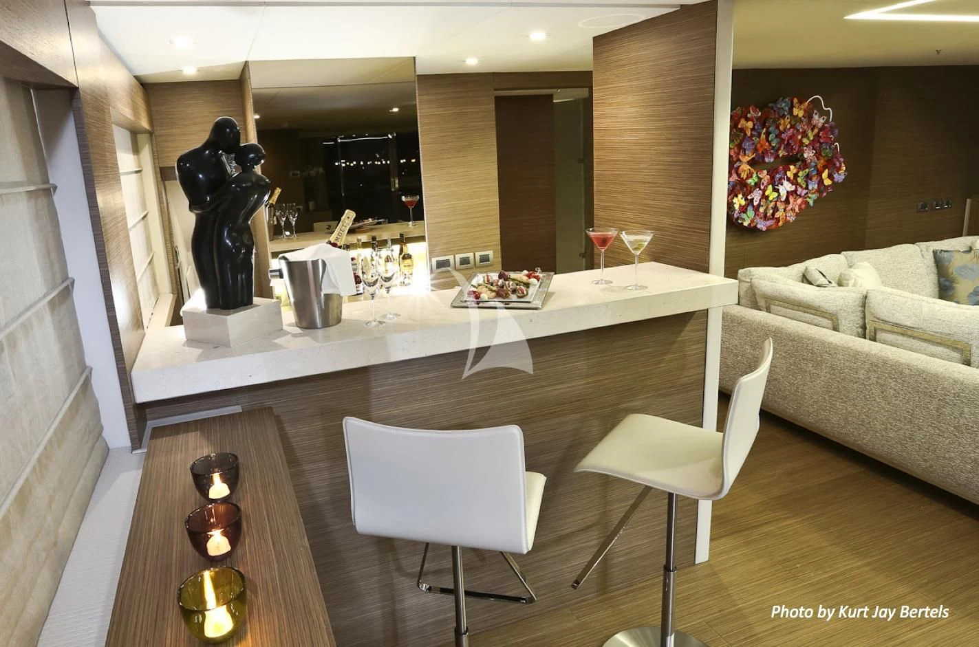 a living room with a table and chairs aboard IPANEMAS Yacht for Sale
