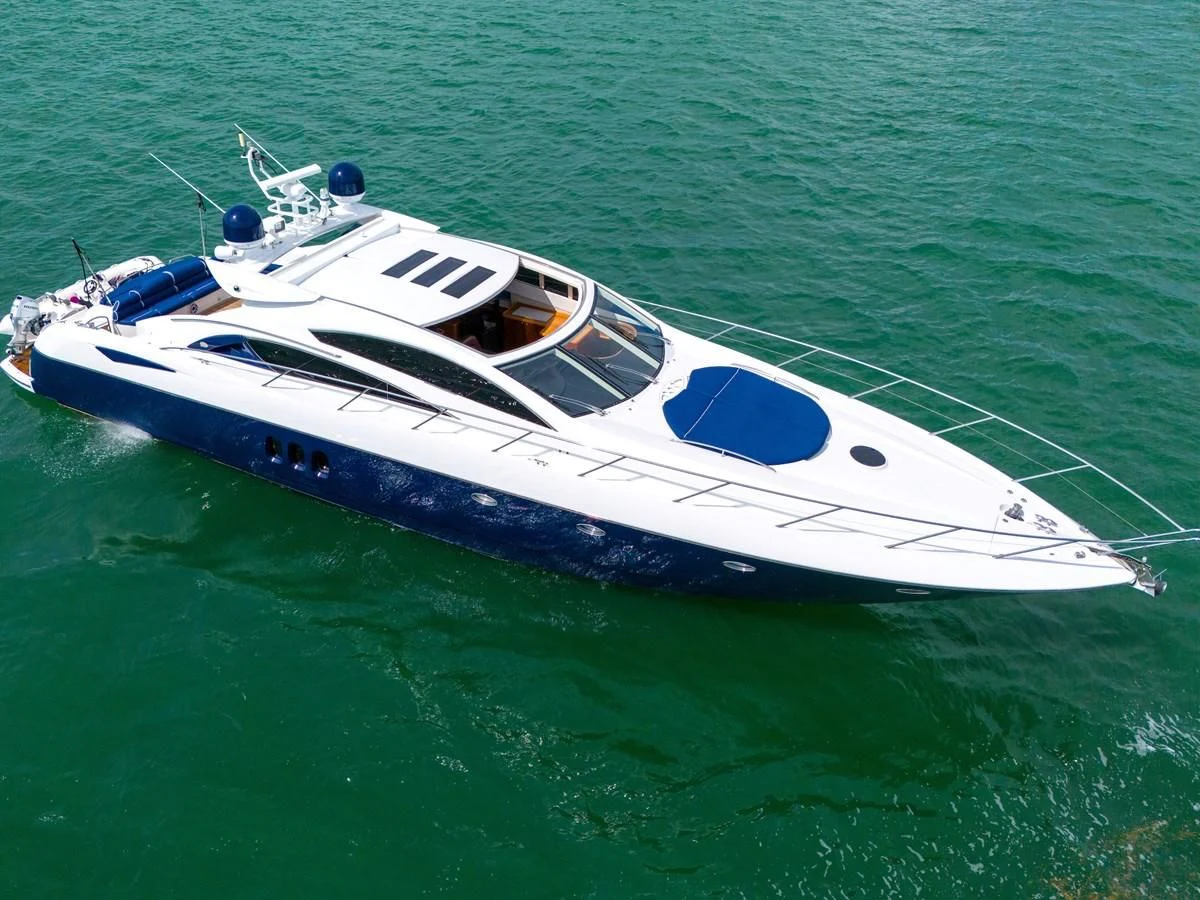 a white boat in the water aboard 82' SUNSEEKER PREDATOR 82 Yacht for Sale