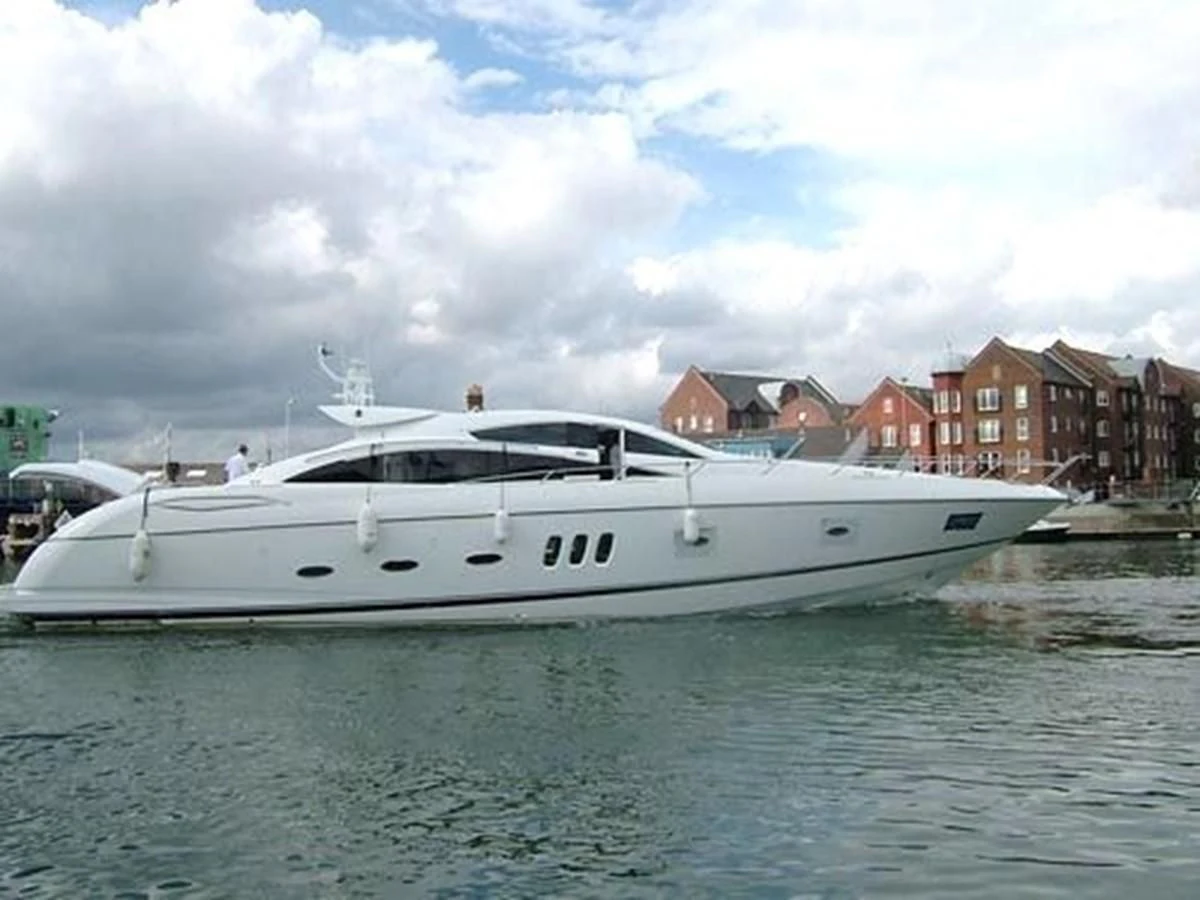 a white yacht in the water aboard 82' SUNSEEKER PREDATOR 82 Yacht for Sale