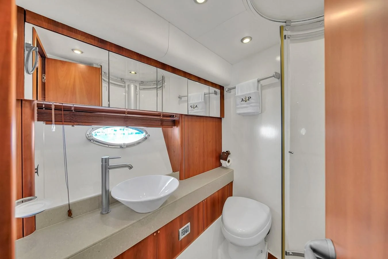 a bathroom with a sink and a toilet aboard 82' SUNSEEKER PREDATOR 82 Yacht for Sale
