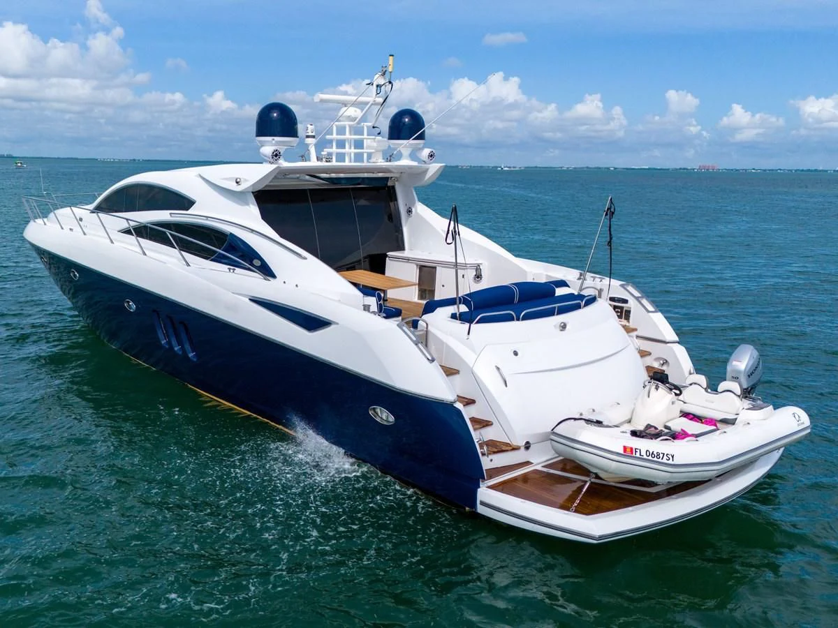 a couple of white yachts in the water aboard 82' SUNSEEKER PREDATOR 82 Yacht for Sale