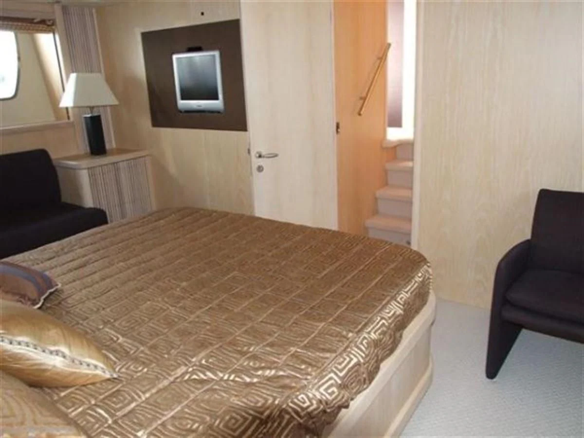 a bed in a hotel room aboard 82' SUNSEEKER PREDATOR 82 Yacht for Sale