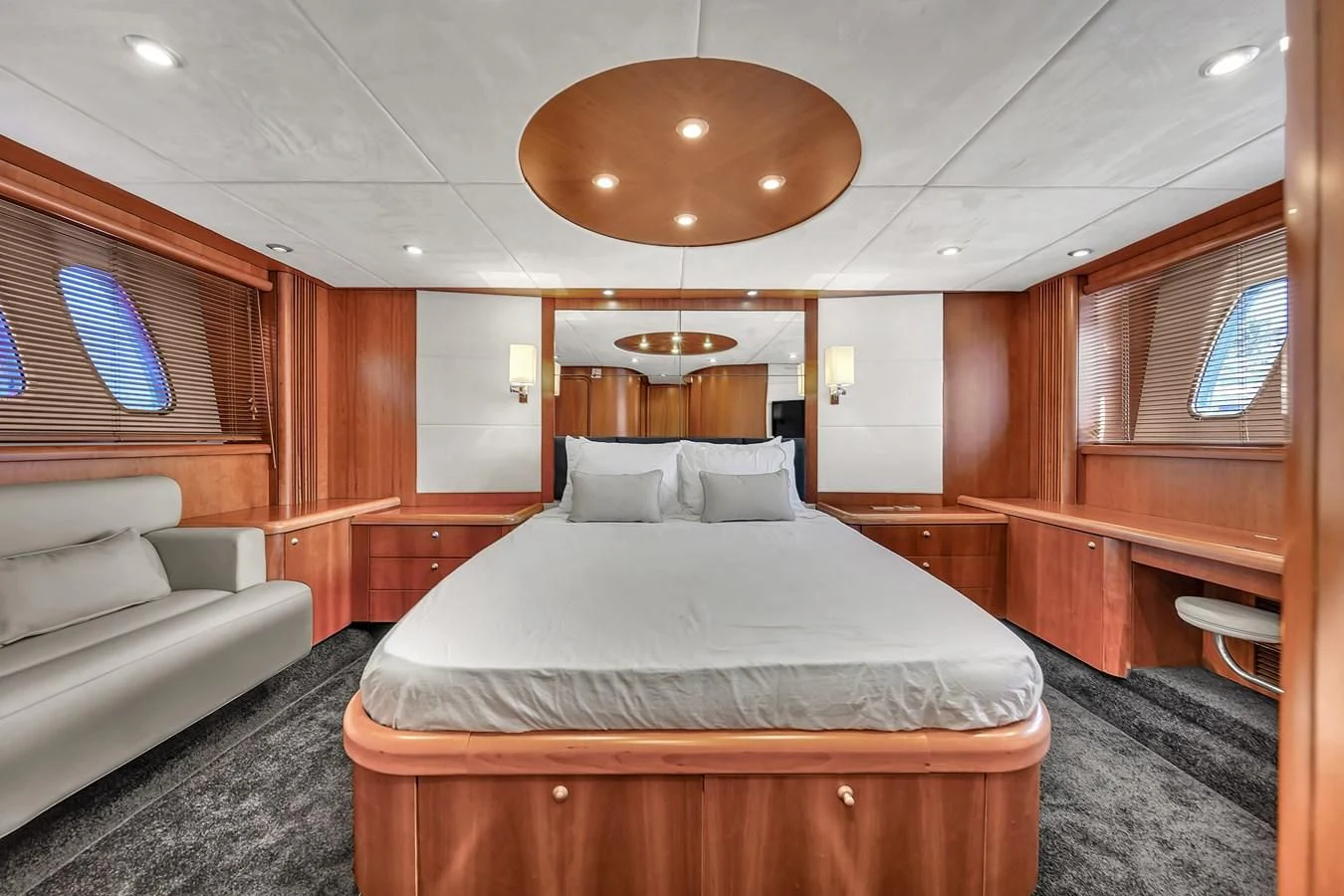 a large bed in a cabin aboard 82' SUNSEEKER PREDATOR 82 Yacht for Sale