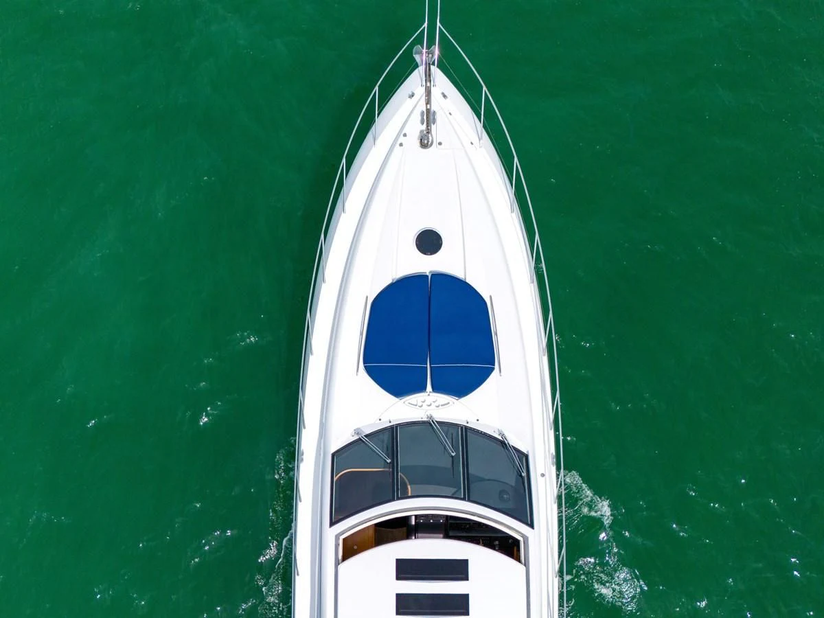 a white tower with a blue circle aboard 82' SUNSEEKER PREDATOR 82 Yacht for Sale
