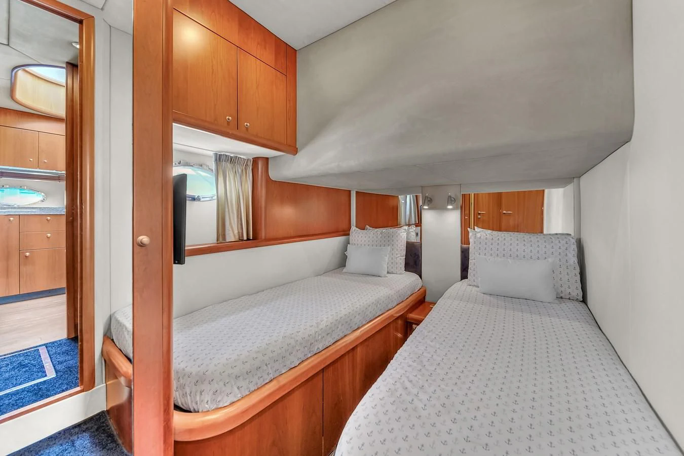 a bed in a room aboard 82' SUNSEEKER PREDATOR 82 Yacht for Sale